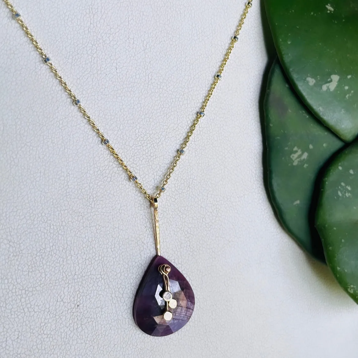 Pendulum dots teardrop plum sapphire necklace